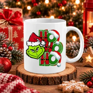 Grincs Ho Ho Ho bögre mikulássapkás zöld figurával és piros-zöld karácsonyi felirattal